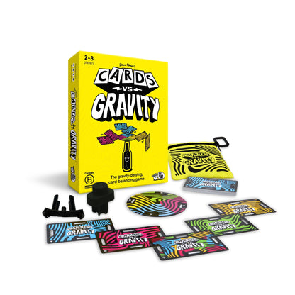 Cards vs. Gravity game set with box, cards, and accessories on a white background