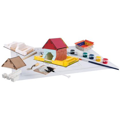Children's playset with building blocks, paint, and tools on a white surface